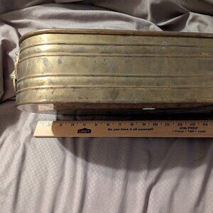 Brass oval planter, 18 inches long x 6 inches wide, $11.